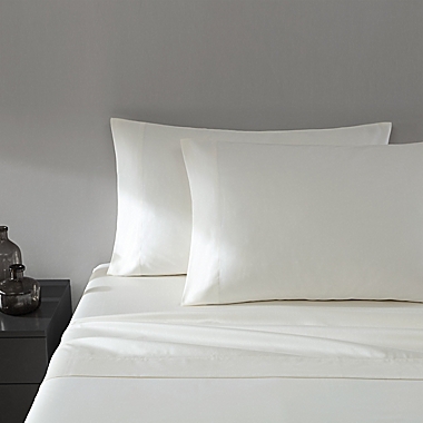Vera Wang&reg; Solid 800-Thread-Count Sateen Queen Sheet Set in Ivory. View a larger version of this product image.