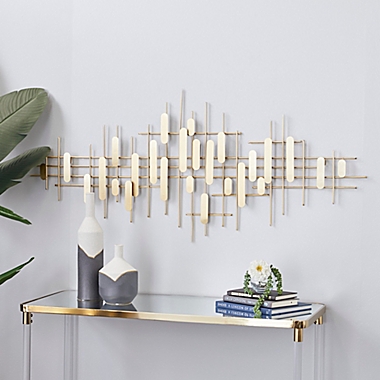 CosmoLiving by Cosmopolitan 58-Inch x 25-Inch Metal Wall D&eacute;cor in Gold. View a larger version of this product image.