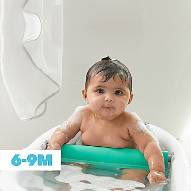Fridababy&reg; 4-in-1 Grow-with-Me Bath Tub in White. View a larger version of this product image.