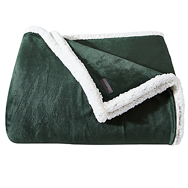 Eddie Bauer&reg; Solid Ultra Soft Plush Fleece Reversible Twin Blanket in Dark Pine. View a larger version of this product image.