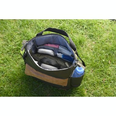 goldbug&trade; Multi-Tasker Convertible Diaper Backpack in Green. View a larger version of this product image.