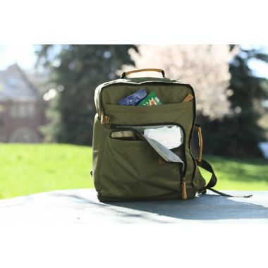 goldbug&trade; Side-Carry Diaper Backpack in Green. View a larger version of this product image.