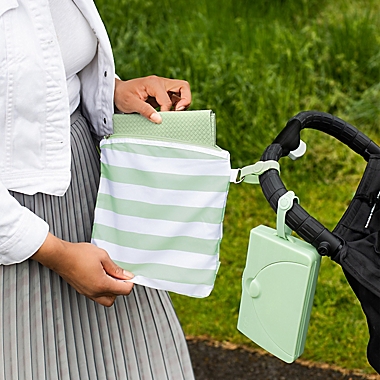 Ubbi&reg; On the Go Diaper Changing Mat and Storage Bag . View a larger version of this product image.
