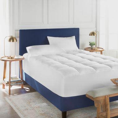 Everhome&trade; Ultra-Plush 825-Thread-Count Twin Mattress Pad with True Grip&reg;. View a larger version of this product image.