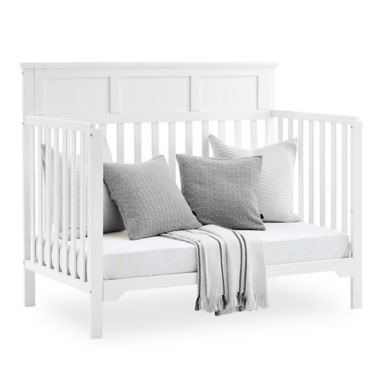 Delta Children Sweet Beginnings Hart Flat Top 6-in-1 Convertible Crib in Bianca White. View a larger version of this product image.