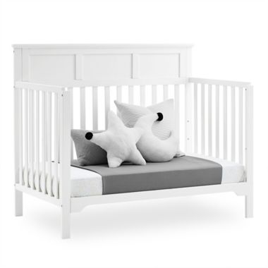 Delta Children Sweet Beginnings Hart Flat Top 6-in-1 Convertible Crib in Bianca White. View a larger version of this product image.