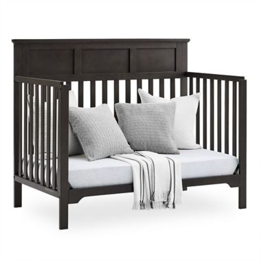 Delta Children Sweet Beginnings Hart Flat Top 6-in-1 Convertible Crib in Stone Grey. View a larger version of this product image.
