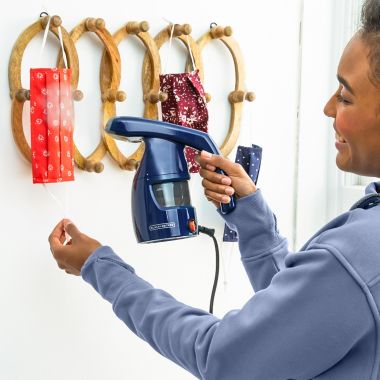 Black & Decker&trade; HGS011S Easy Garment Steamer in Navy. View a larger version of this product image.