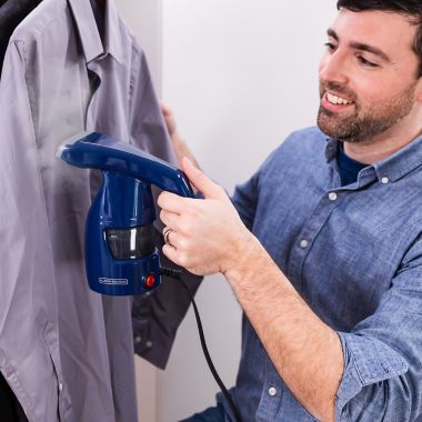 Black & Decker&trade; HGS011S Easy Garment Steamer in Navy. View a larger version of this product image.