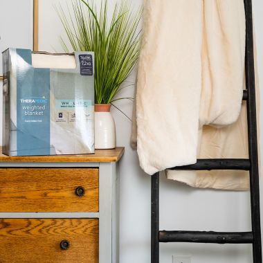 Therapedic&reg; Faux Fur 16 oz. Weighted Blanket in Ivory. View a larger version of this product image.