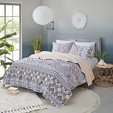 Madison Park&reg; Anisa Printed Microfiber 3-Piece Full/Queen Coverlet Set in Blue/Blush. View a larger version of this product image.