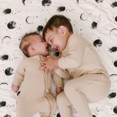 goumi Organic Cotton Many Moons Cozy Blanket in Black/Yellow. View a larger version of this product image.