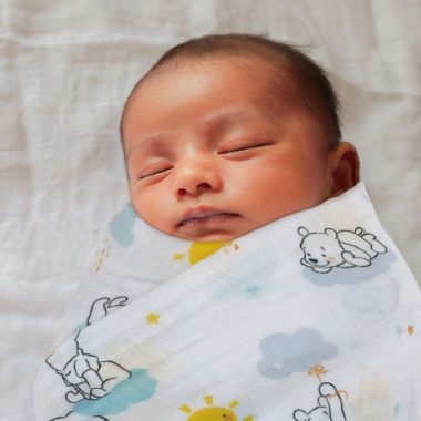 Disney Baby&reg; 3-Piece Winnie the Pooh Swaddle Set with Rattle in Yellow. View a larger version of this product image.