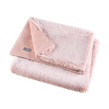 UGG&reg; Dawson Faux Fur Toddler Blanket in Peach. View a larger version of this product image.
