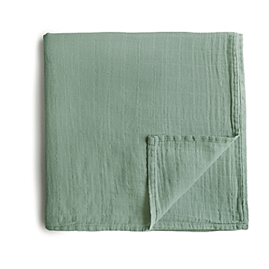 Mushie&reg; Muslin Organic Cotton Swaddle Blanket in Green. View a larger version of this product image.