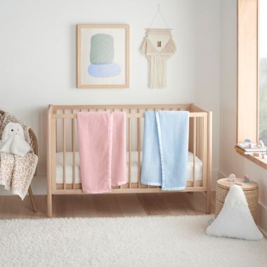 UGG&reg; Tillie Carved Plush Toddler Blanket in Pink Shell. View a larger version of this product image.