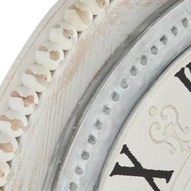 Ridge Road Decor 22-Inch Round Wood Farmhouse Wall Clock in White. View a larger version of this product image.