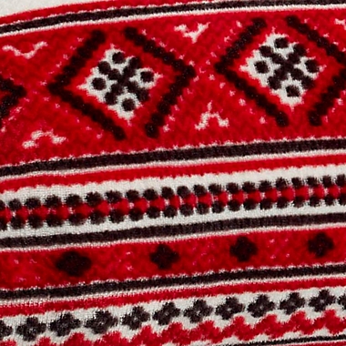 Eddie Bauer&reg; Classic Fair Isle Ultra Soft Plush Fleece Reversible Twin Blanket in Red. View a larger version of this product image.