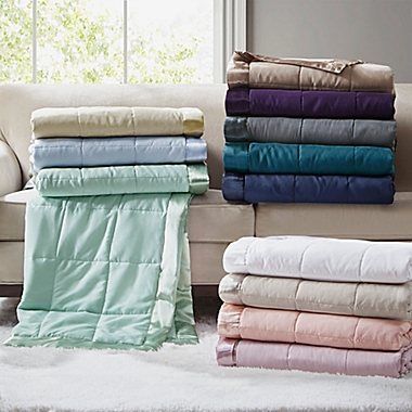 Madison Park&reg; Windom Twin Microfiber Throw Blanket in Teal. View a larger version of this product image.