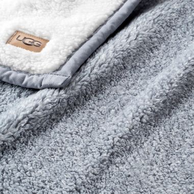 UGG&reg; Sherpa Blanket in Ash Fog. View a larger version of this product image.