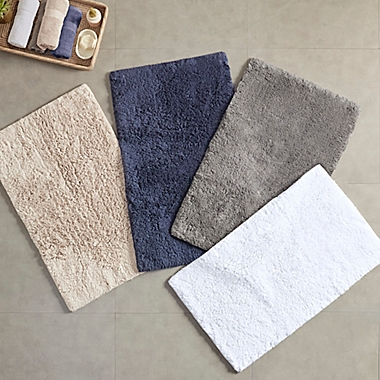 Madison Park Signature Ritzy 100% Cotton Solid Tufted Bath Rug Set in Natural (Set of 2). View a larger version of this product image.