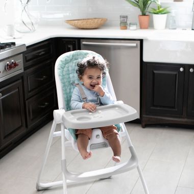 Ity by Ingenuity&trade; Yummity Yum Easy Folding High Chair in Green. View a larger version of this product image.