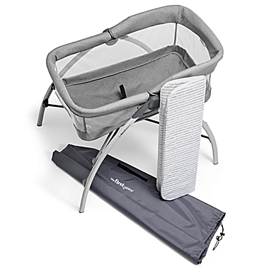 The First Years&trade; First Dreams Portable Bassinet Baby Sleeper in Grey. View a larger version of this product image.