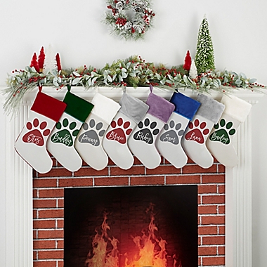 Pet Paw Personalized Faux Fur Christmas Stocking in Ivory. View a larger version of this product image.