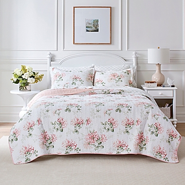 Laura Ashley&reg; Honeysuckle 3-Piece Reversible King Quilt Set in Blush Pink. View a larger version of this product image.
