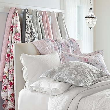 Laura Ashley&reg; Honeysuckle 3-Piece Reversible King Quilt Set in Blush Pink. View a larger version of this product image.