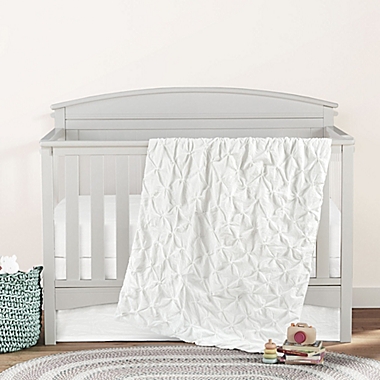 Lush D&eacute;cor Ravello Pintuck Embellished 3-Piece Crib Bedding Set in White. View a larger version of this product image.