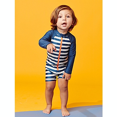 Tea Collection&reg; Size 2T Rash Guard Swimsuit in Navy Stripe. View a larger version of this product image.