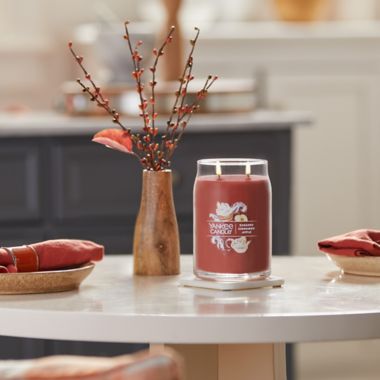 Yankee Candle&reg; Sugared Cinnamon Apple 20 oz. Large Jar Candle. View a larger version of this product image.