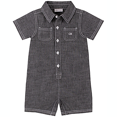 Calvin Klein&reg; Size 12M CK Logo Washed Chambray Romper in Blue. View a larger version of this product image.