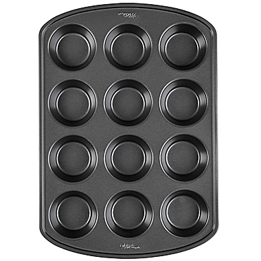 Wilton&reg; Perfect Results Nonstick 12-Cup Muffin Pan in Grey. View a larger version of this product image.