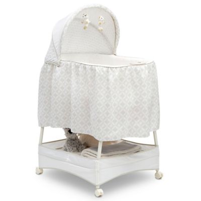 Delta Children Illusions Soothe and Glide Bassinet in Beige