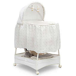 Delta Children Illusions Soothe and Glide Bassinet in Beige