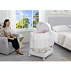 Alternate image 2 for Delta Children Illusions Soothe and Glide Bassinet in Beige