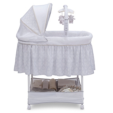 Simmons Kids Gliding Bedside Bassinet in White. View a larger version of this product image.