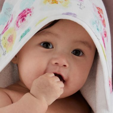 The Honest Company&reg; 9-Piece Floral Bubbles &amp; Cuddles Bath Gift Set in Pink/White. View a larger version of this product image.