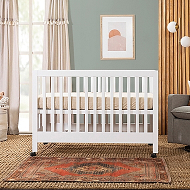 Babyletto Maki Full Size Portable Crib in White. View a larger version of this product image.
