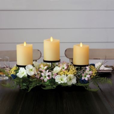 Luminara&reg; Spring Centerpiece with Three 4-Inch LED Pillar Candles. View a larger version of this product image.