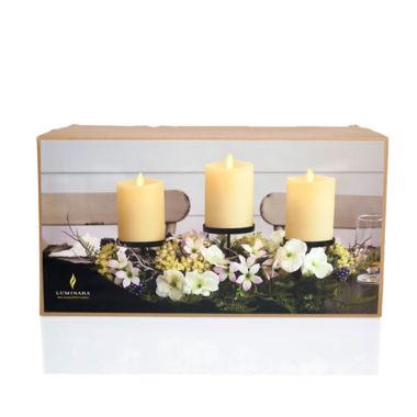 Luminara&reg; Spring Centerpiece with Three 4-Inch LED Pillar Candles. View a larger version of this product image.