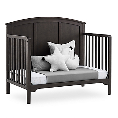 Delta Children Sweet Beginnings Sage Curve Top 6-in-1 Convertible Crib in Stone Grey. View a larger version of this product image.