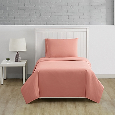 Simply Essential&trade; Truly Soft&trade; Microfiber Twin XL Sheet Set in Coral Haze. View a larger version of this product image.