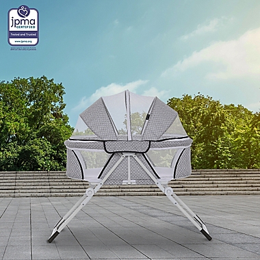 Dream On Me Karley Plus Portable Bassinet in Storm Grey. View a larger version of this product image.