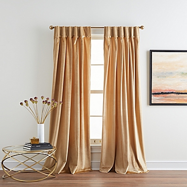 DKNY Velvet Inverted Pleat 96-Inch Tab Top Window Curtain Panels in Gold (Set of 2). View a larger version of this product image.