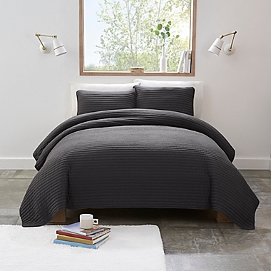 UGG&reg; Devon 3-Piece King Quilt Set in Off Black. View a larger version of this product image.