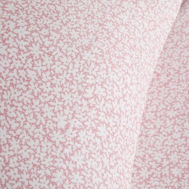 Wild Sage&trade; Daisy Scatter 300-Thread-Count Twin Sheet Set in Peachskin. View a larger version of this product image.