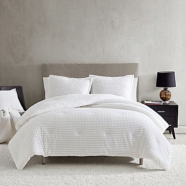 UGG&reg; Avery 3-Piece Reversible Full/Queen Comforter Set in Snow Rivet. View a larger version of this product image.